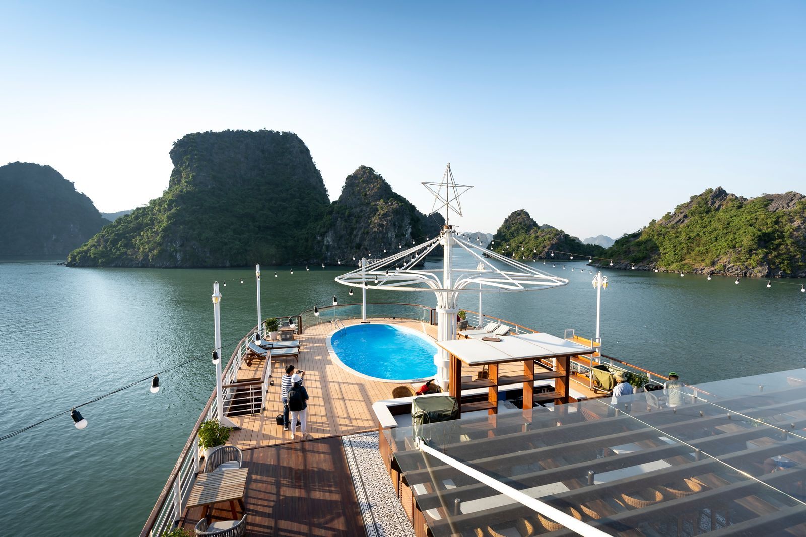 Pool deck of a cruise boat among limestone islands, one take on the most fun cruise lines
